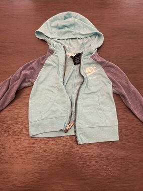 Nike Kids Hooded Zip Sweatshirt in Teal with blue Raglan Sleeves